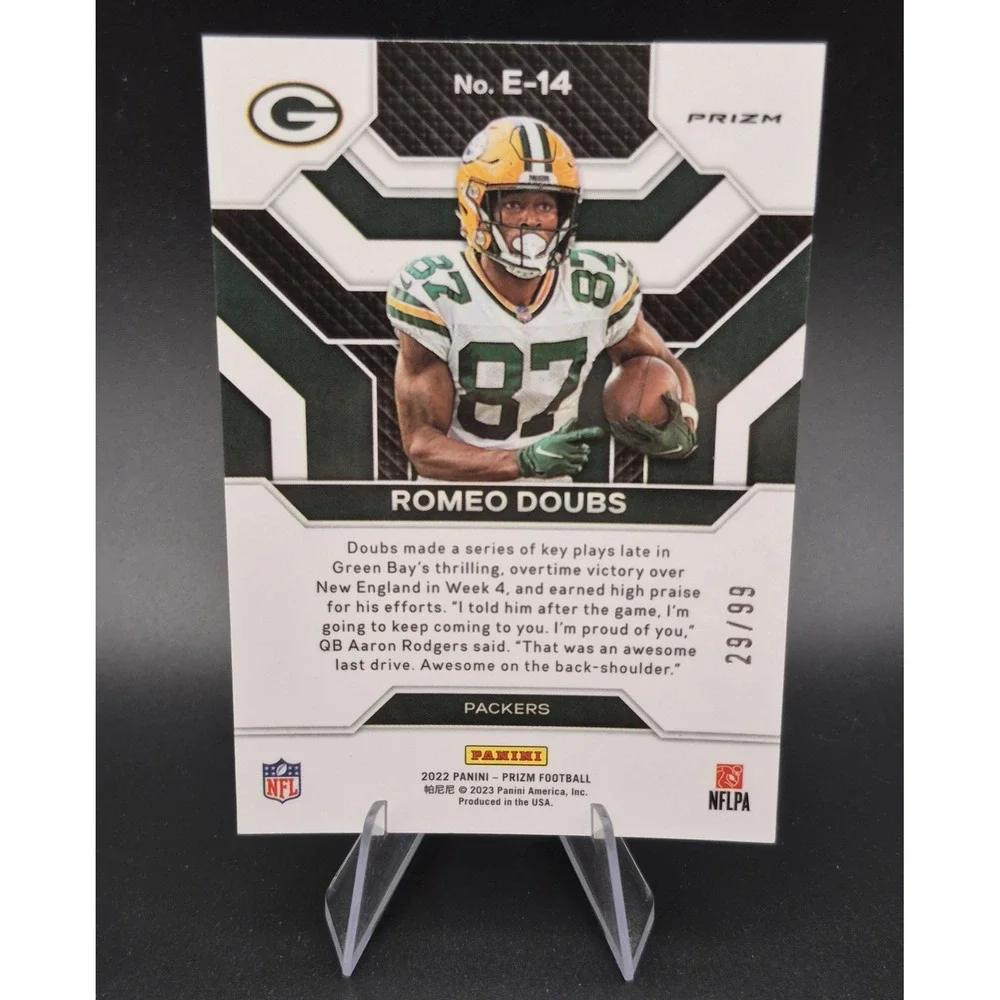 2022‎ Panini Prizm Romeo Doubs #E-14 Emergent Blue Ice Prizm /99 (RC) Packers